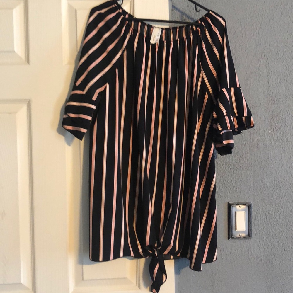 Never been worn. Black tunic.